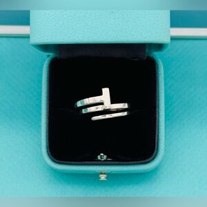 Tiffany & Co SS Retired T Wrap Ring Size 5.5
